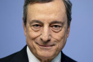 FILE– President of European Central Bank Mario Draghi looks on prior to a press conference following a meeting of the governing council in Frankfurt, Germany, Thursday, July 25, 2019. Italian President Sergio Mattarella has summoned Tuesday, Feb. 2, 2021, former European Central Bank President Mario Draghi at the Quirinale Presidential Palace on Wednesday for talks, after two rounds of talks failed to seal an agreement among parties on a new premiership for the outgoing Giuseppe Conte. (AP Photo/Michael Probst)
