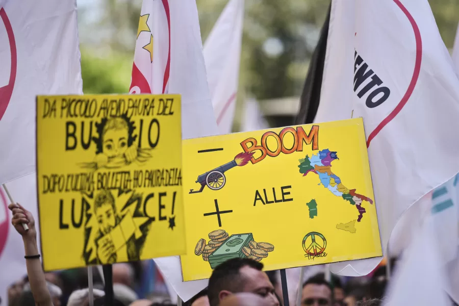 Protesters take part in a demonstration organized by the Italian Five star movement against plans to increase military expenditure, in Rome, Saturday, April 5, 2025. (AP Photo/Andrew Medichini)